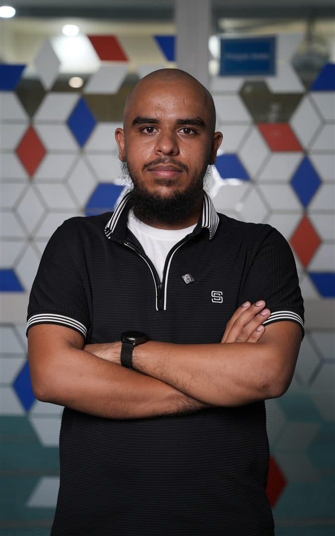 Sir Mustafa Moten, Business & Economics teacher